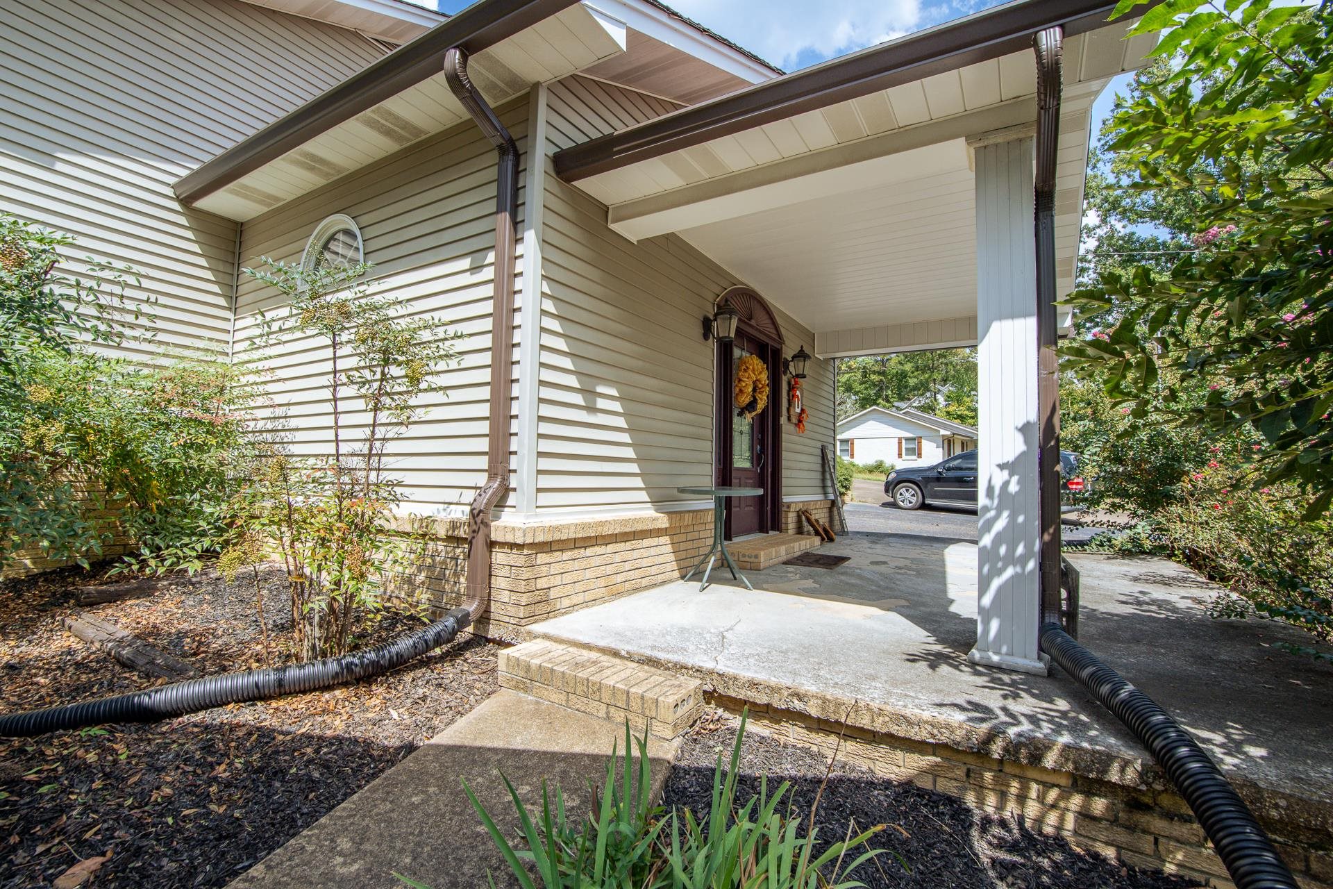 313 Country Club Lane Selmer, TN 38375 - Photo 34 of 36 a view of a backyard with sitting area