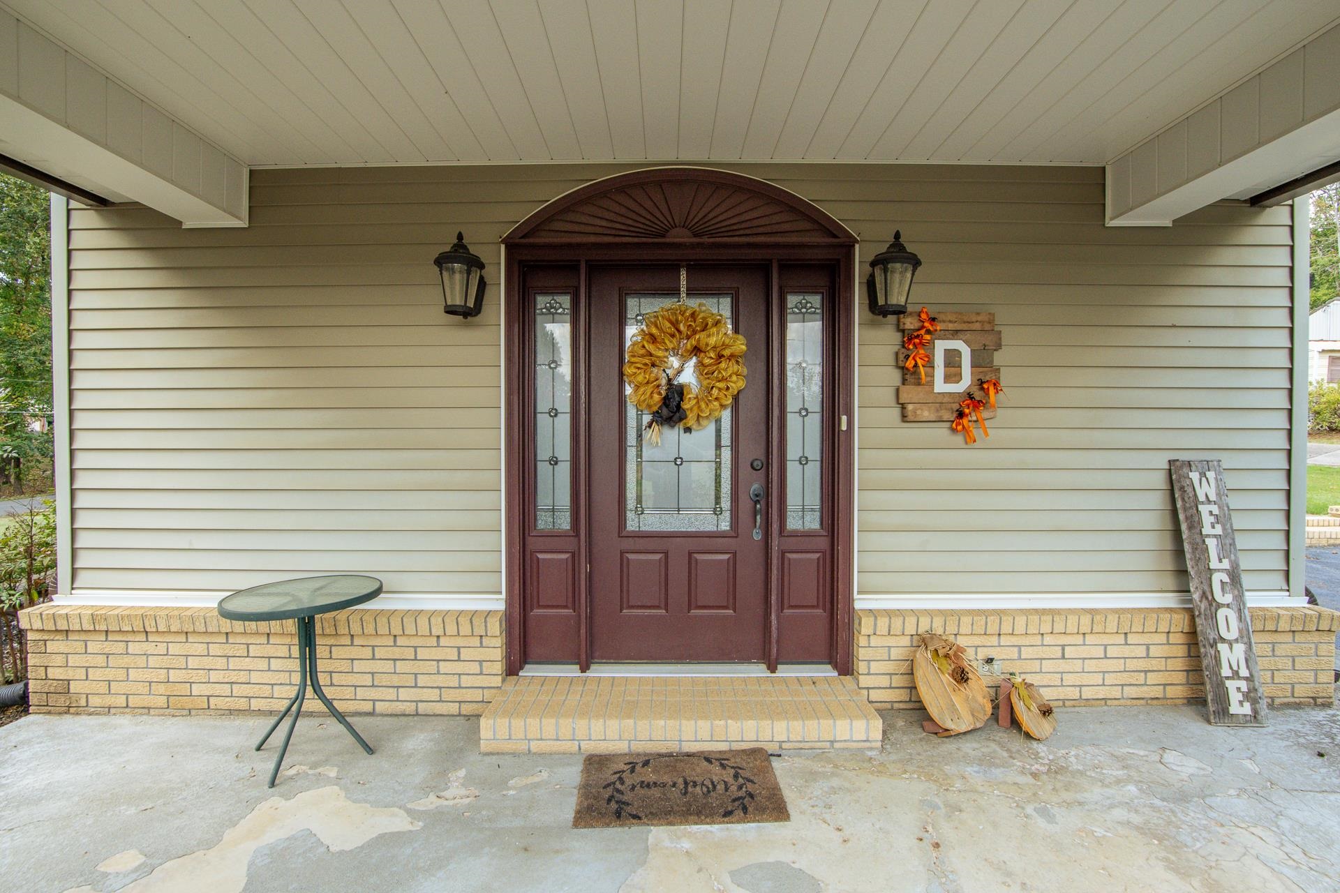 313 Country Club Lane Selmer, TN 38375 - Photo 36 of 36 a front view of a house with a garage