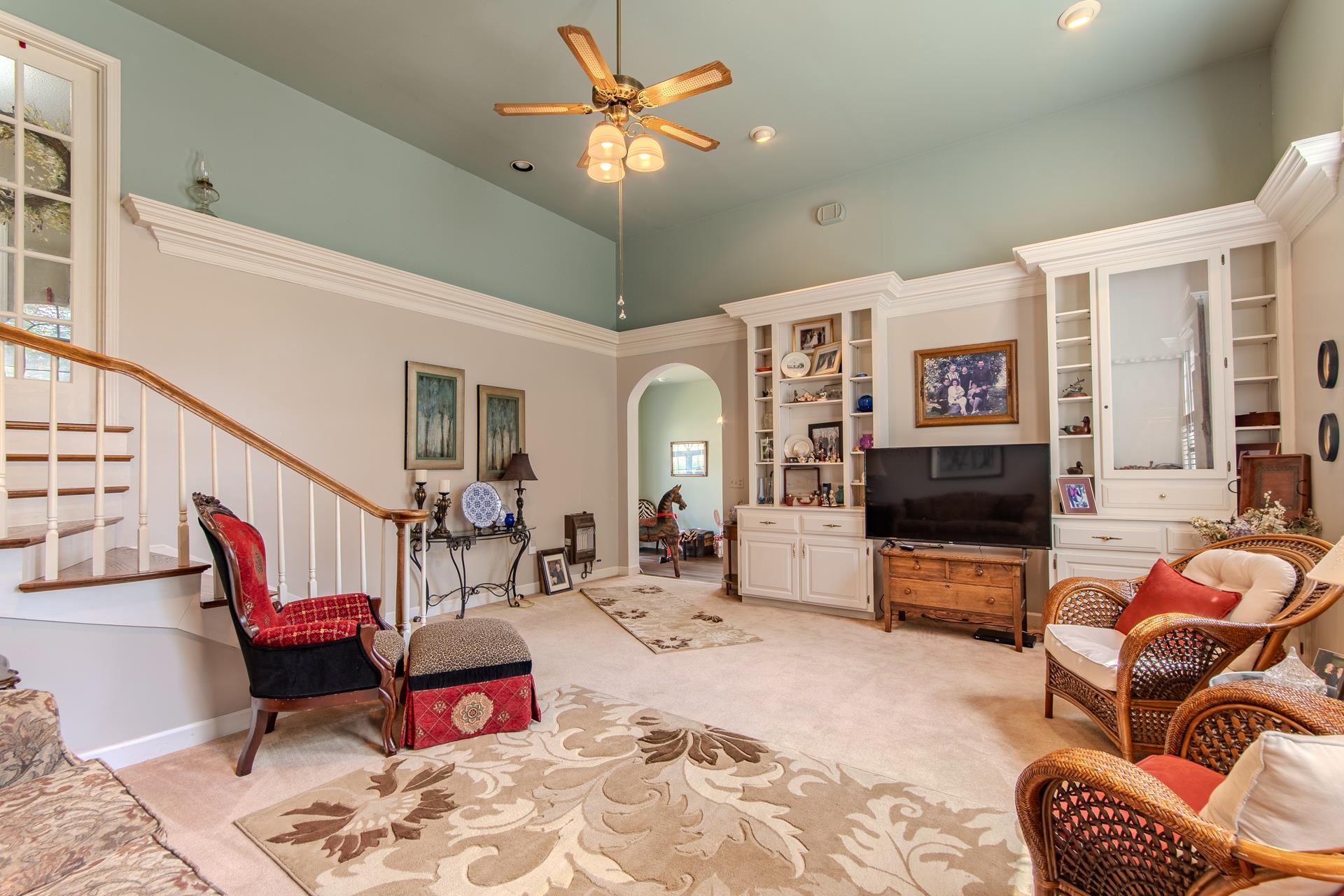 313 Country Club Lane Selmer, TN 38375 - Photo 6 of 36 a living room with furniture flat screen tv and a fireplace