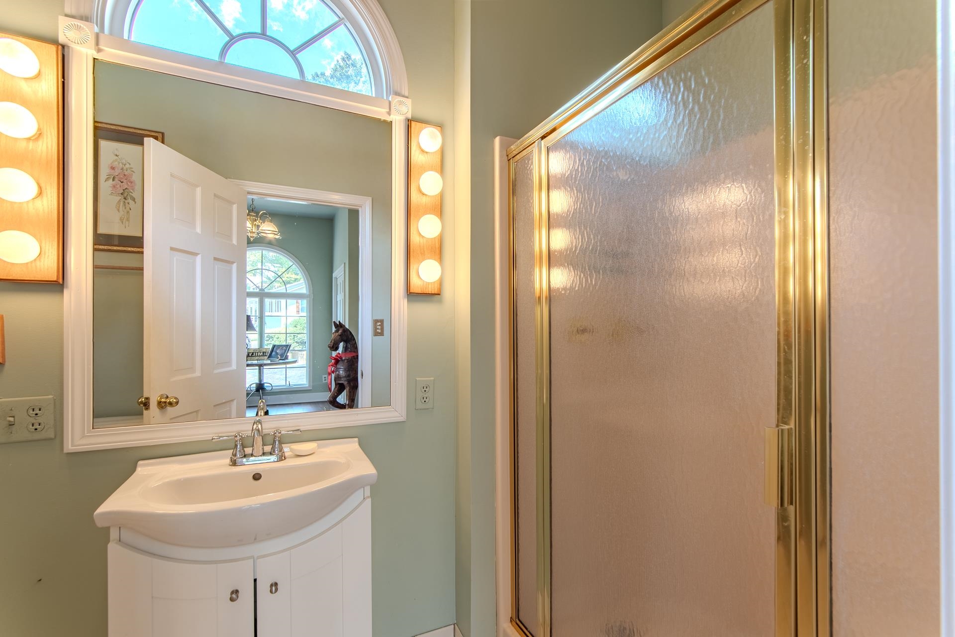 313 Country Club Lane Selmer, TN 38375 - Photo 9 of 36 a bathroom with a sink and a mirror