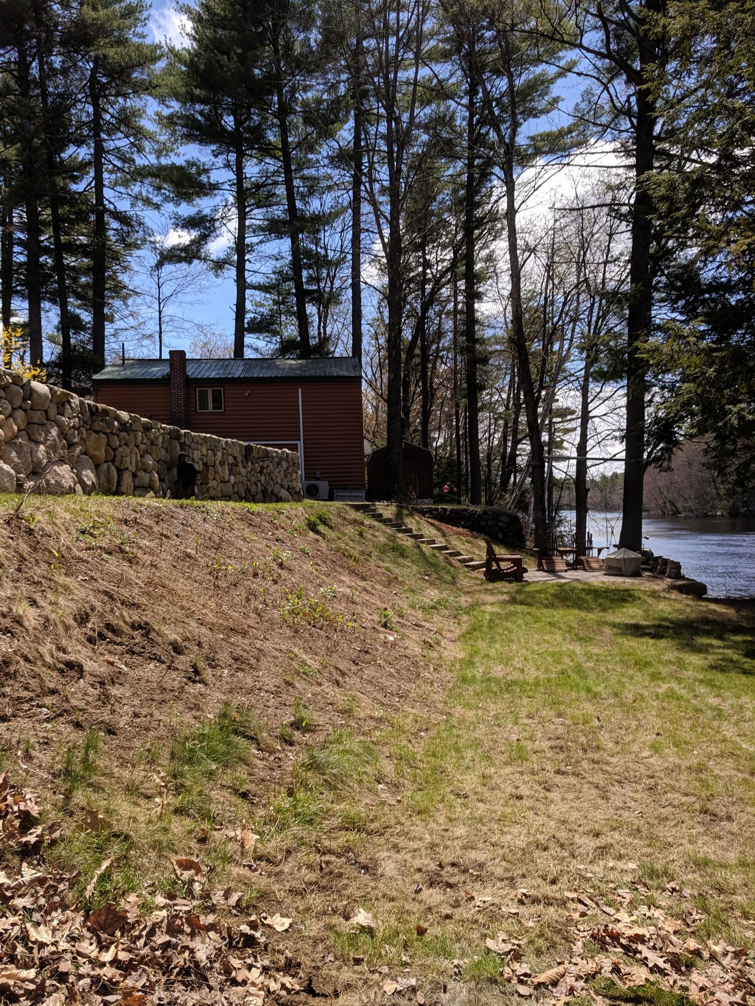 25 Eaton Road Standish, ME 04084 - Photo 25 of 27 25 Eaton rock wall, house, sun