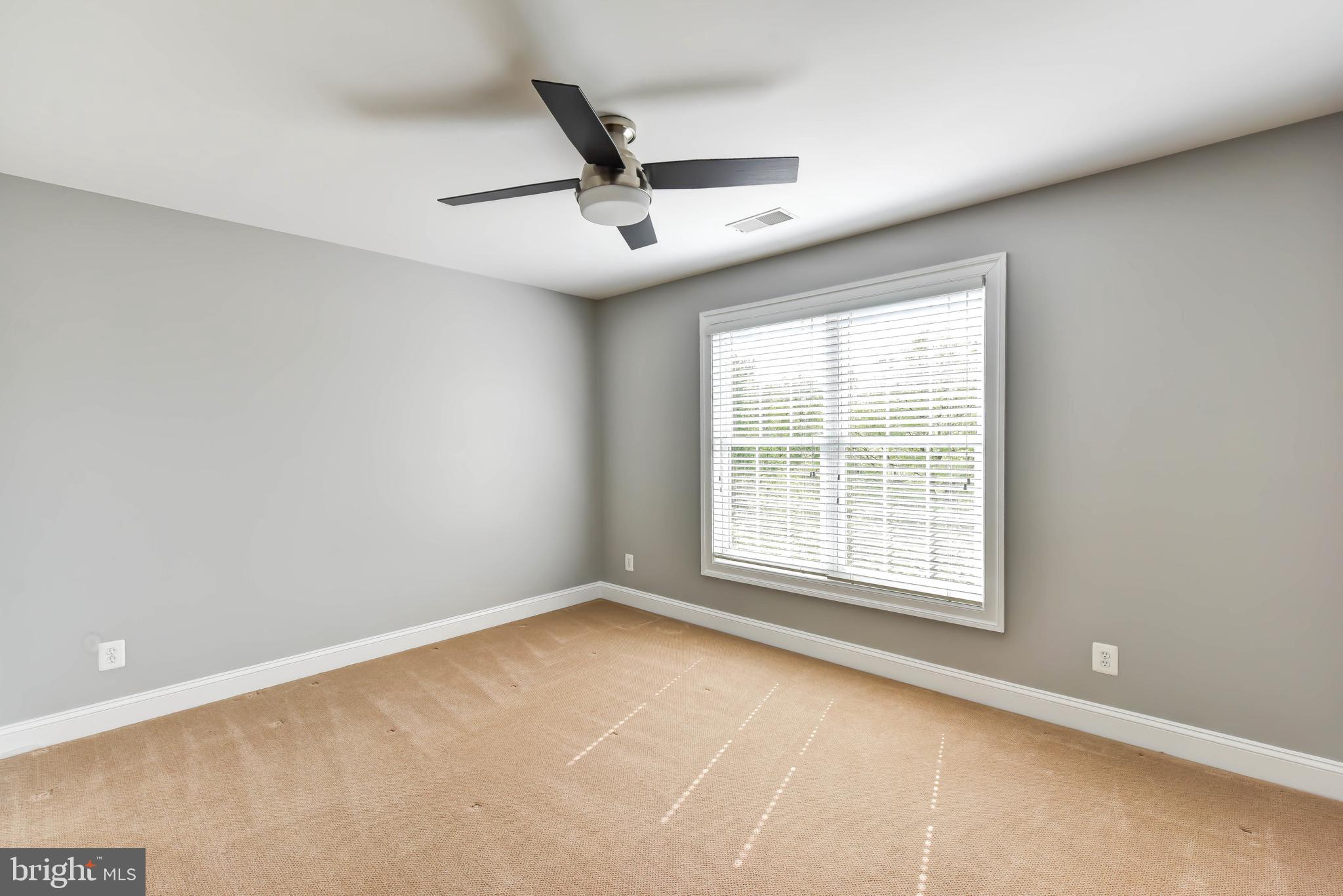 8244 Native Violet Drive Lorton, VA 22079 - Photo 41 of 68 a view of an empty room with a window