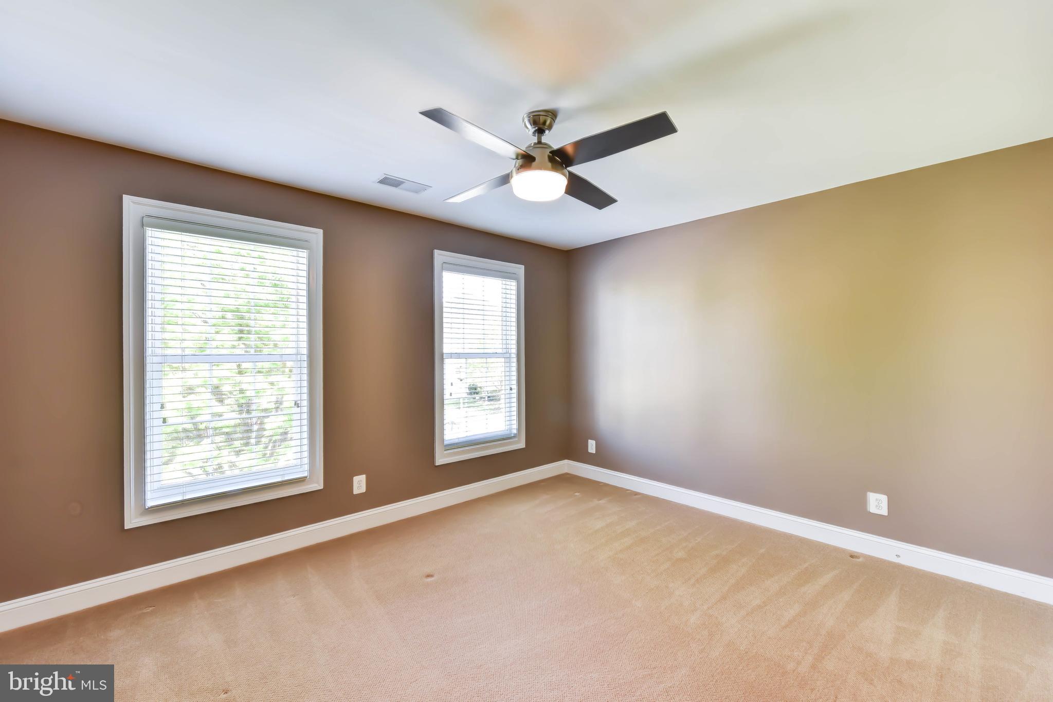 8244 Native Violet Drive Lorton, VA 22079 - Photo 43 of 68 a view of an empty room with a window