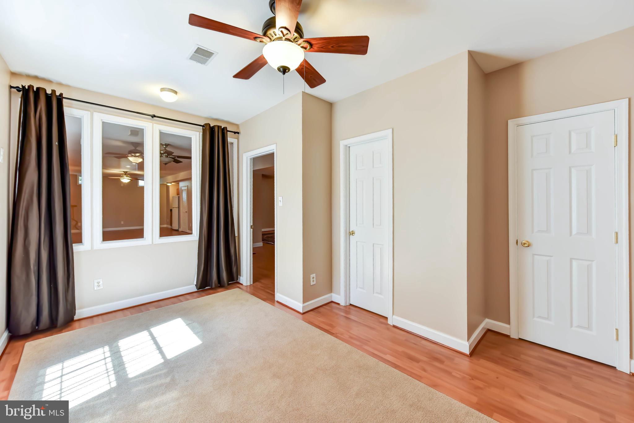 8244 Native Violet Drive Lorton, VA 22079 - Photo 47 of 68 Lower Level Bedroom/ En Suite/ OR gym