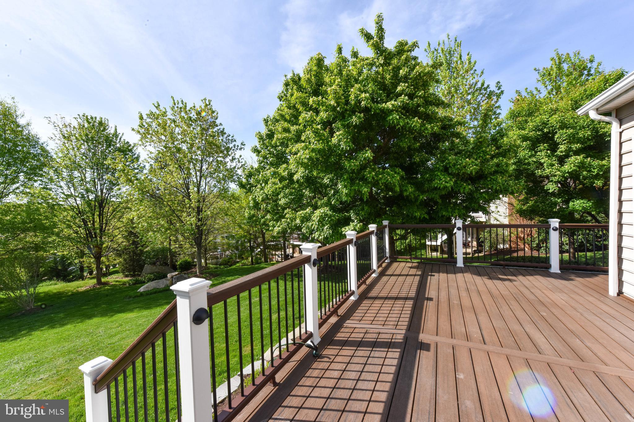 8244 Native Violet Drive Lorton, VA 22079 - Photo 58 of 68 a view of balcony with wooden floor and fence