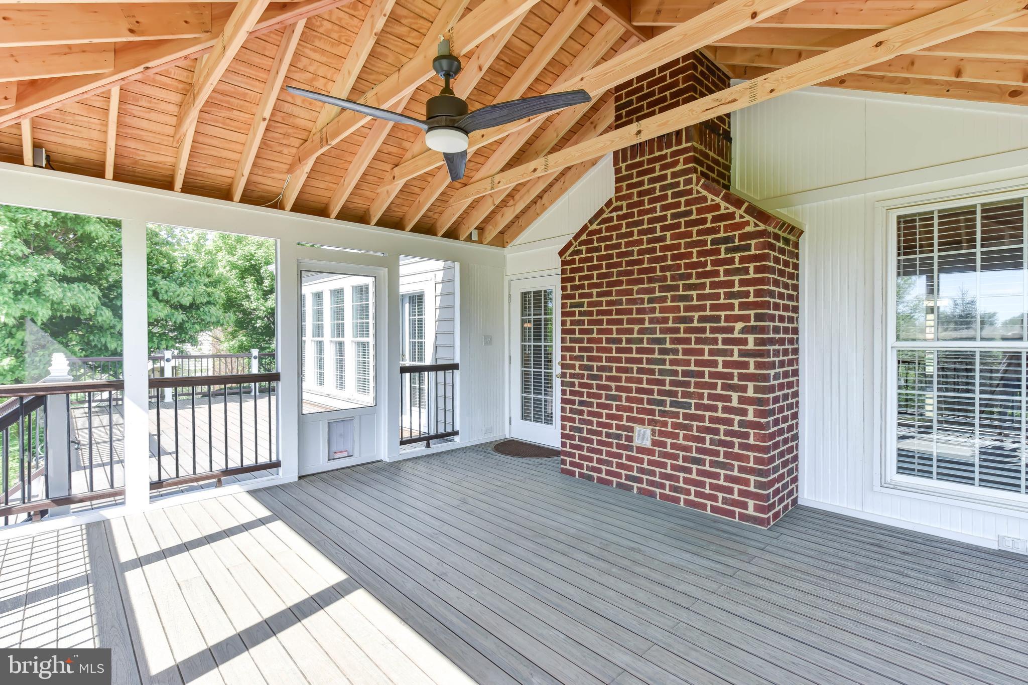 8244 Native Violet Drive Lorton, VA 22079 - Photo 66 of 68 an empty room with wooden floor and windows