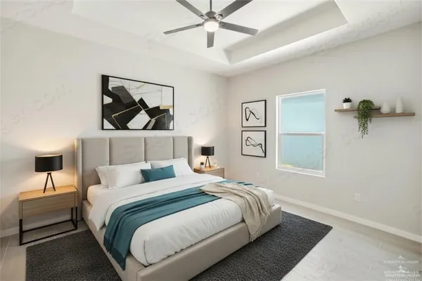 a bedroom with a bed and a painting on the wall