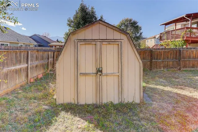 swimming pool view with a seating space