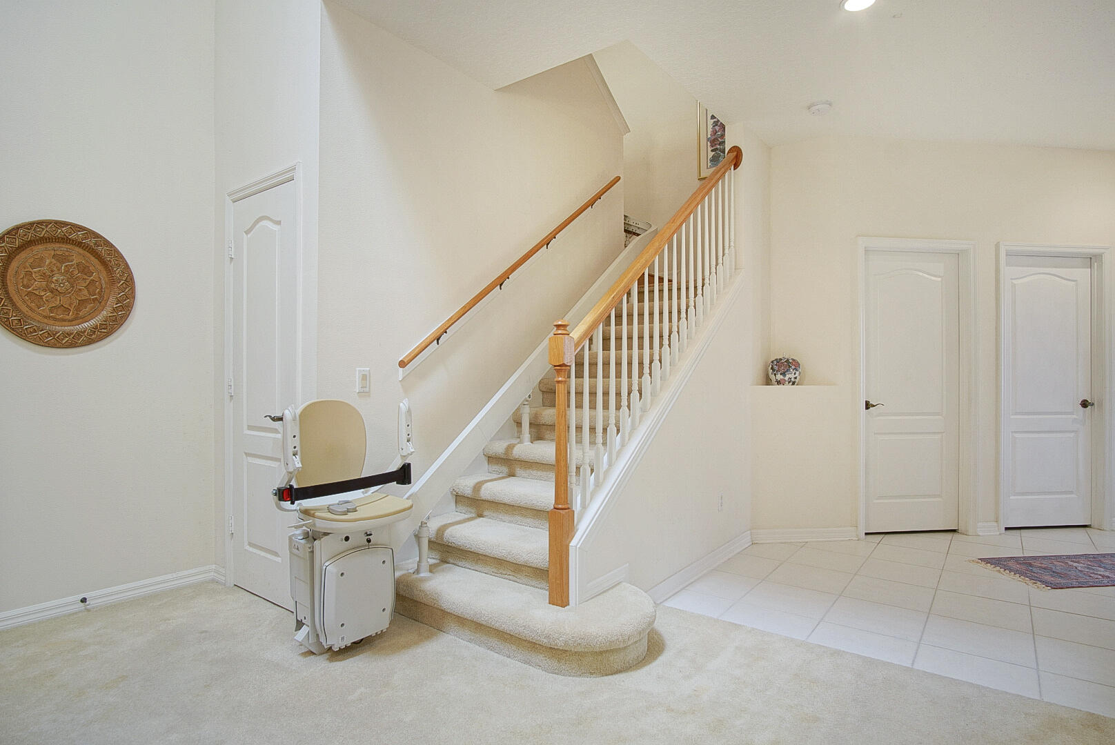 1639 Southwest Harbour Isles Circle, Unit 29 Port St. Lucie, FL 34986 - Photo 11 of 35 a view of entryway with kitchen and workspace