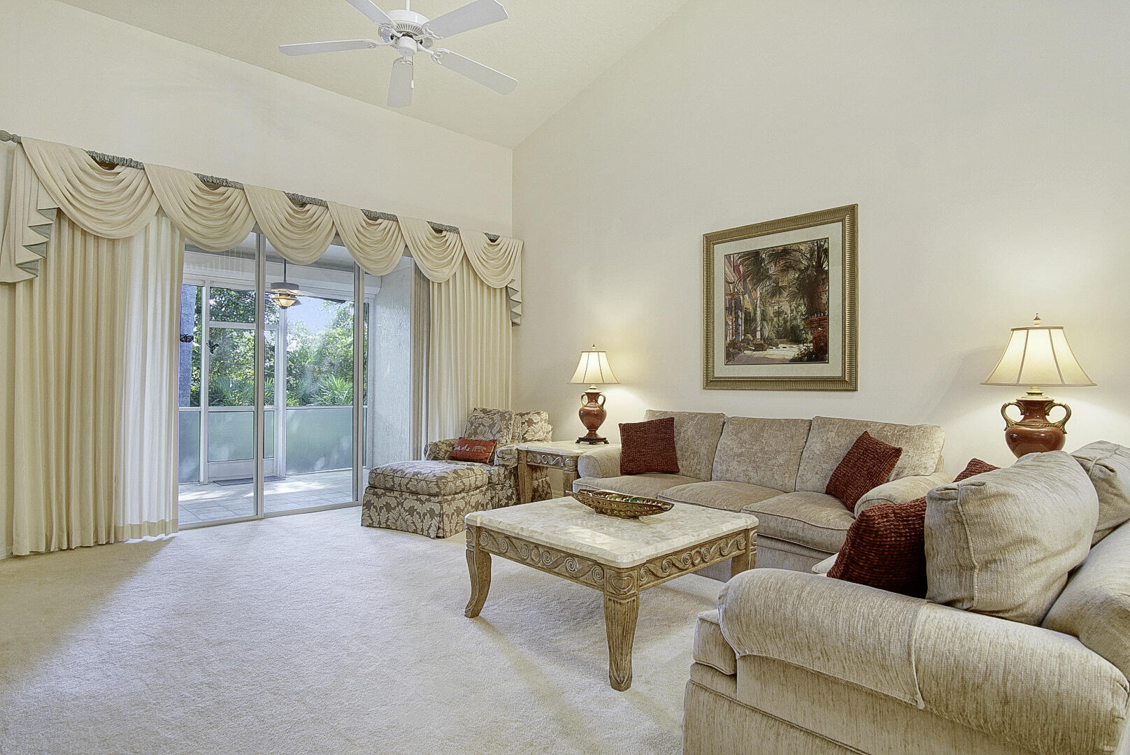 1639 Southwest Harbour Isles Circle, Unit 29 Port St. Lucie, FL 34986 - Photo 13 of 35 a living room with furniture and a large window