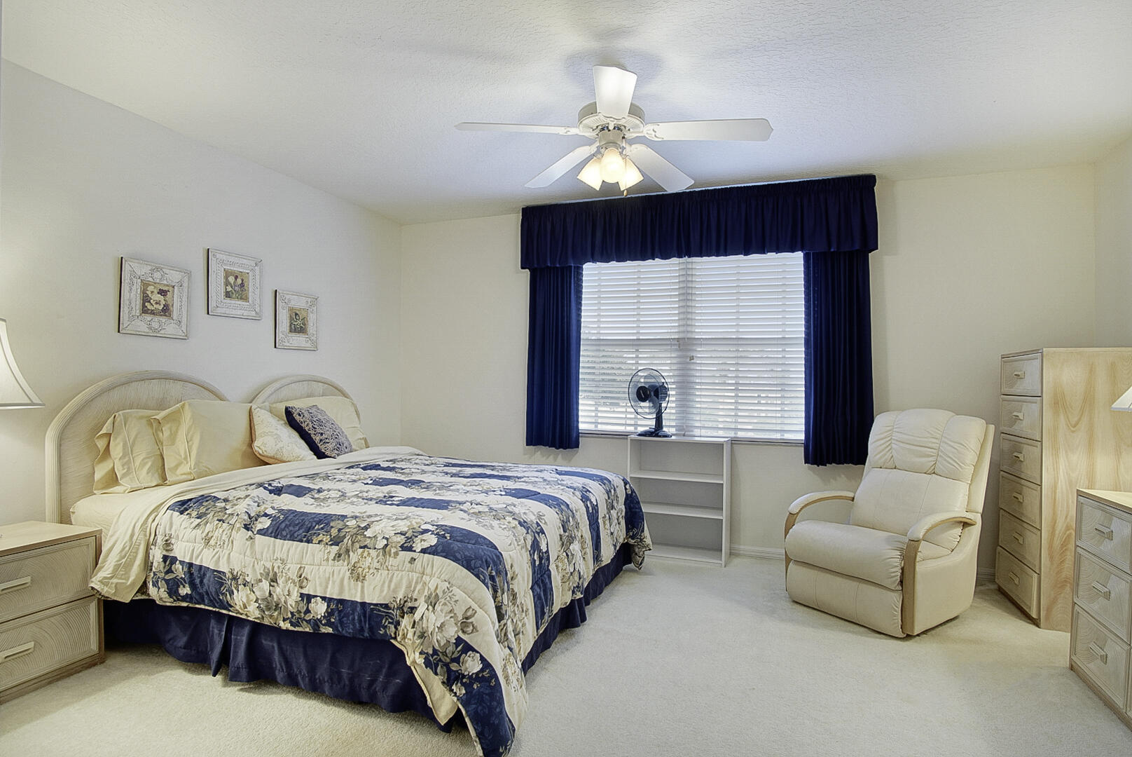 1639 Southwest Harbour Isles Circle, Unit 29 Port St. Lucie, FL 34986 - Photo 16 of 35 a spacious bedroom with a bed and window