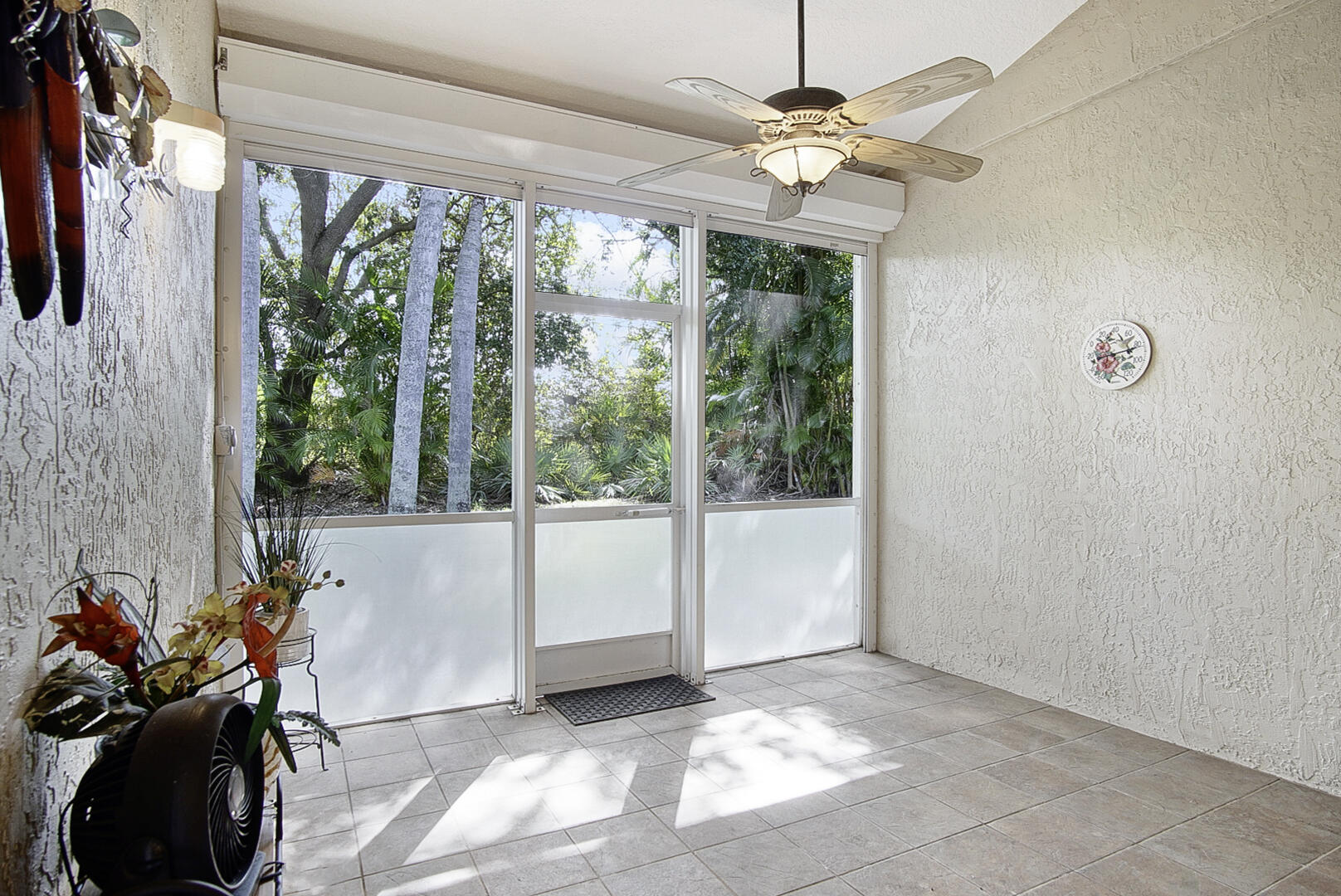 1639 Southwest Harbour Isles Circle, Unit 29 Port St. Lucie, FL 34986 - Photo 22 of 35 a view of a room with furniture and a large window