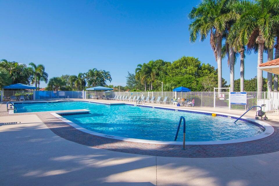 1639 Southwest Harbour Isles Circle, Unit 29 Port St. Lucie, FL 34986 - Photo 32 of 35 a view of a backyard