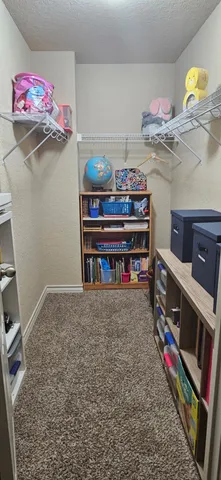 a view of room with cabinets
