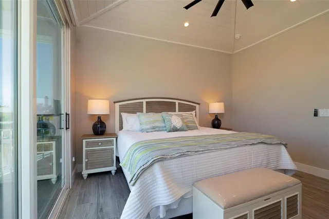 a bathroom with a double vanity sink mirror and shower