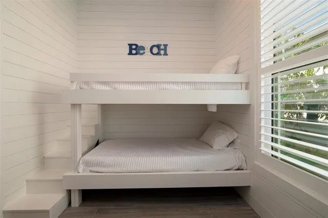 a view of a balcony with chairs