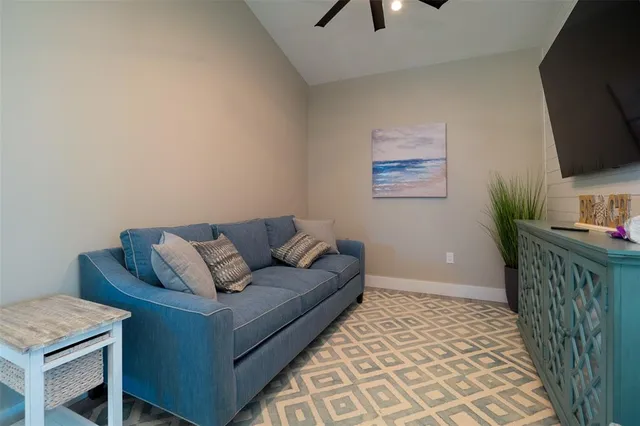 a view of a balcony with wooden floor