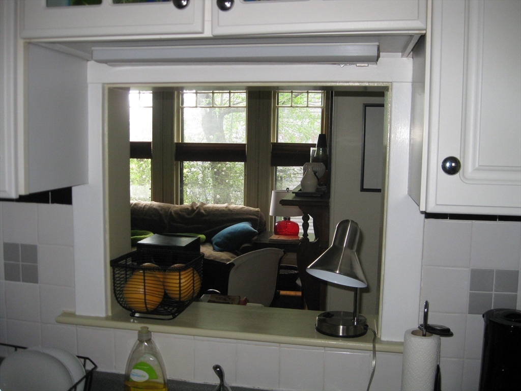 123 Cushing Avenue, Unit 1 Boston, MA 02125 - Photo 12 of 16 a living room with furniture