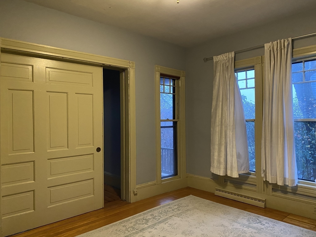 123 Cushing Avenue, Unit 1 Boston, MA 02125 - Photo 5 of 16 a view of a entryway door