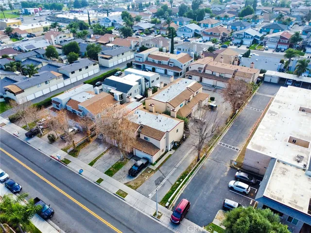 an aerial view of a city with lots of residential buildings