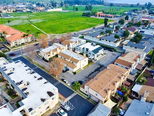 an aerial view of a house with a garden