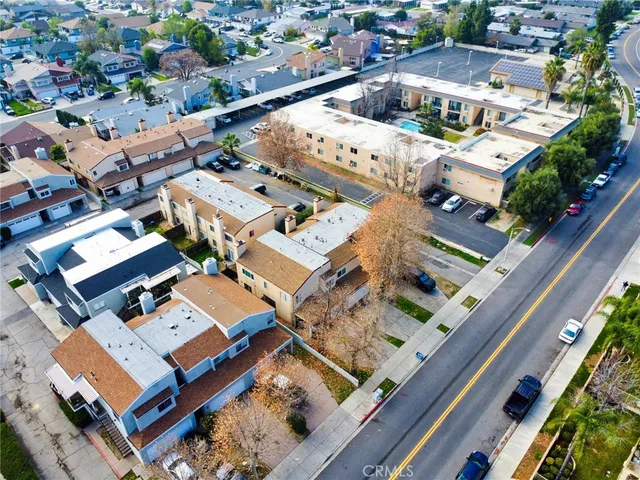 an aerial view of a city with lots of residential buildings