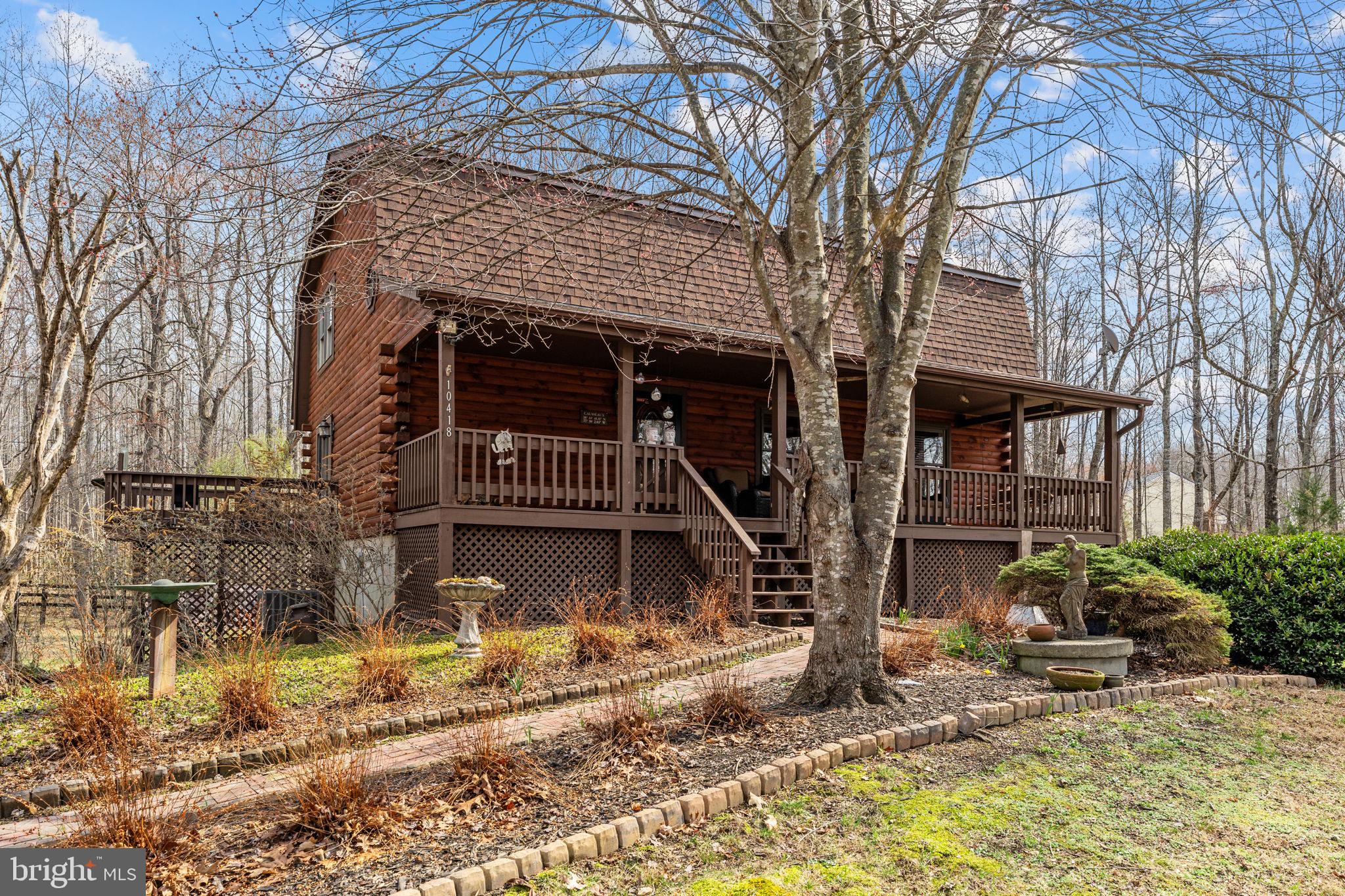 10418 Cliff Mills Road Marshall, VA 20115 - Photo 2 of 93 a house with trees in front of it