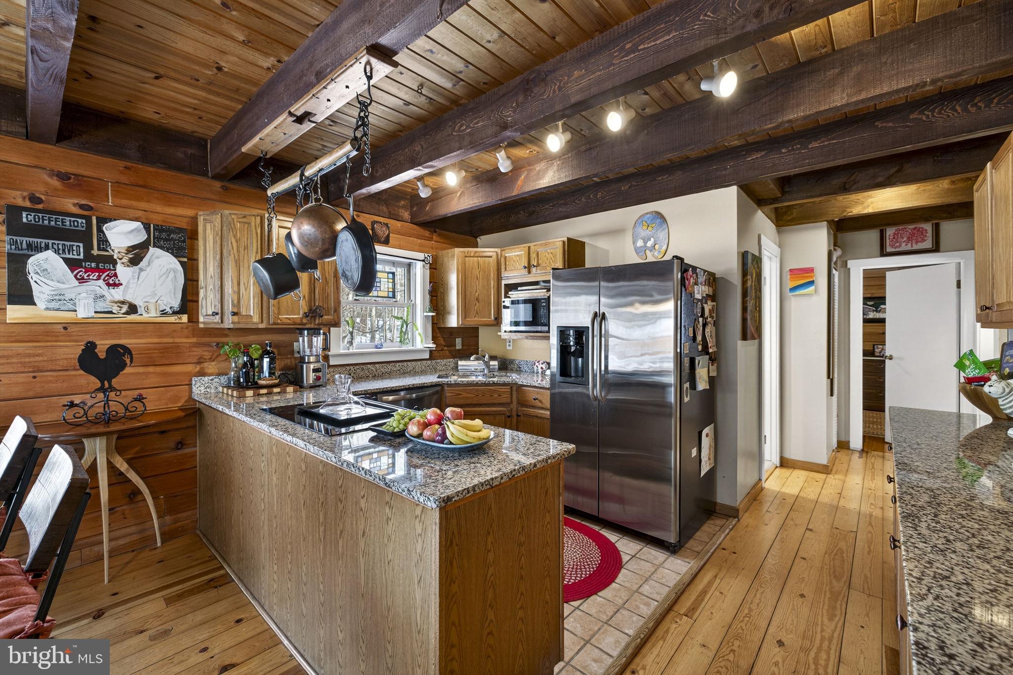 10418 Cliff Mills Road Marshall, VA 20115 - Photo 27 of 93 a kitchen with lots of counter top space and stainless steel appliances