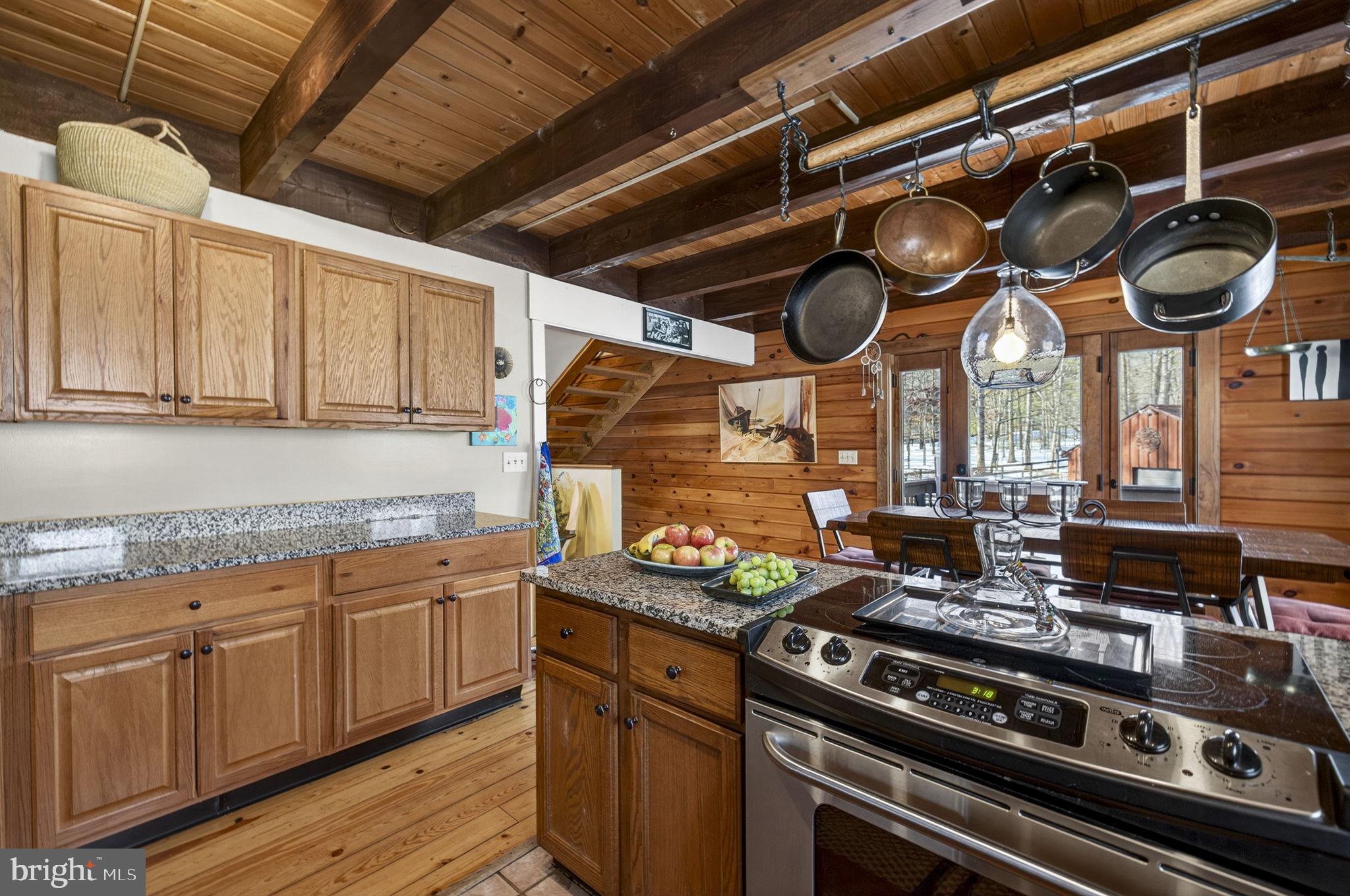 10418 Cliff Mills Road Marshall, VA 20115 - Photo 33 of 93 a kitchen with stainless steel appliances granite countertop a stove and a sink