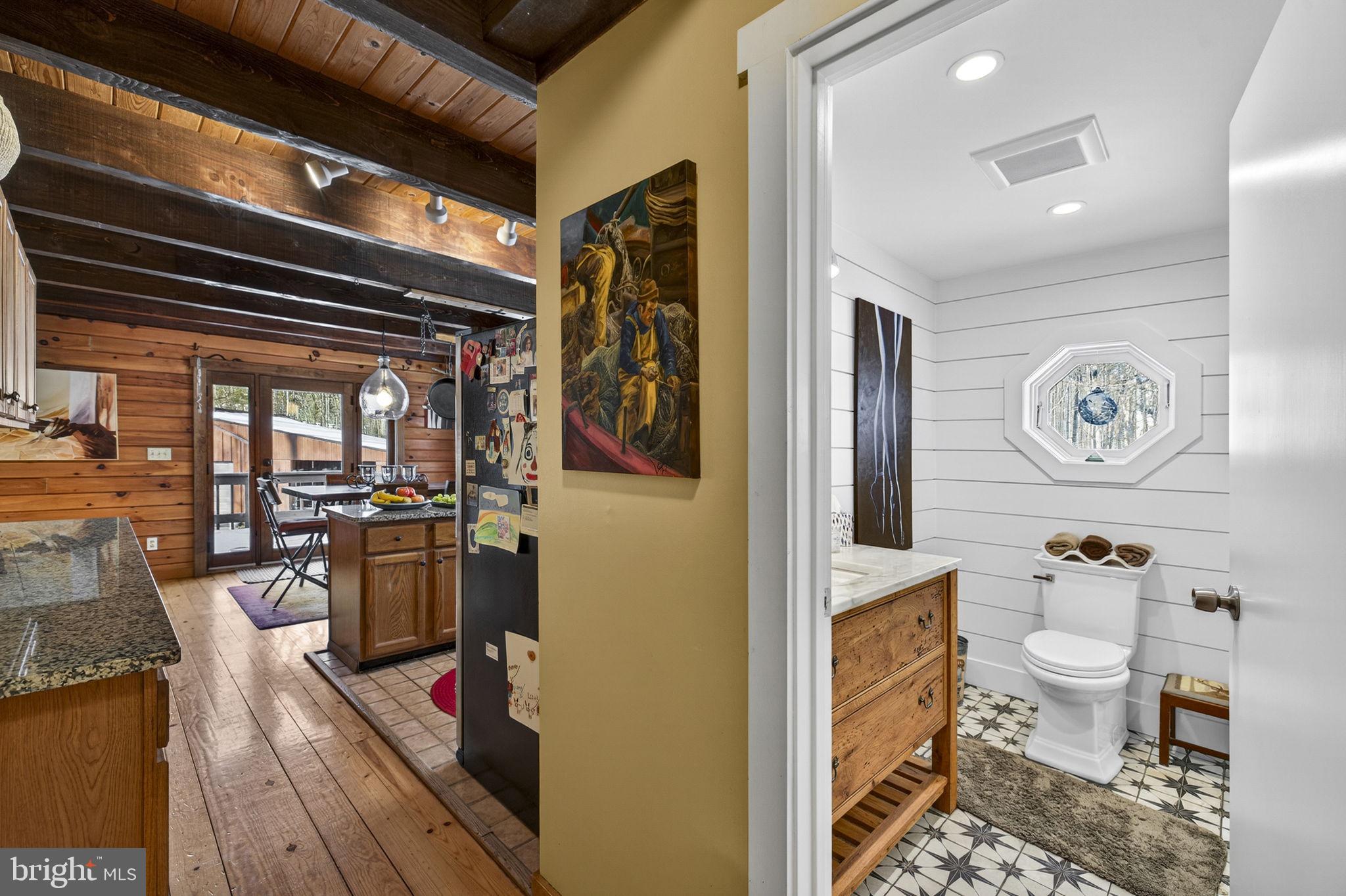 10418 Cliff Mills Road Marshall, VA 20115 - Photo 34 of 93 a living room with furniture and wooden floor