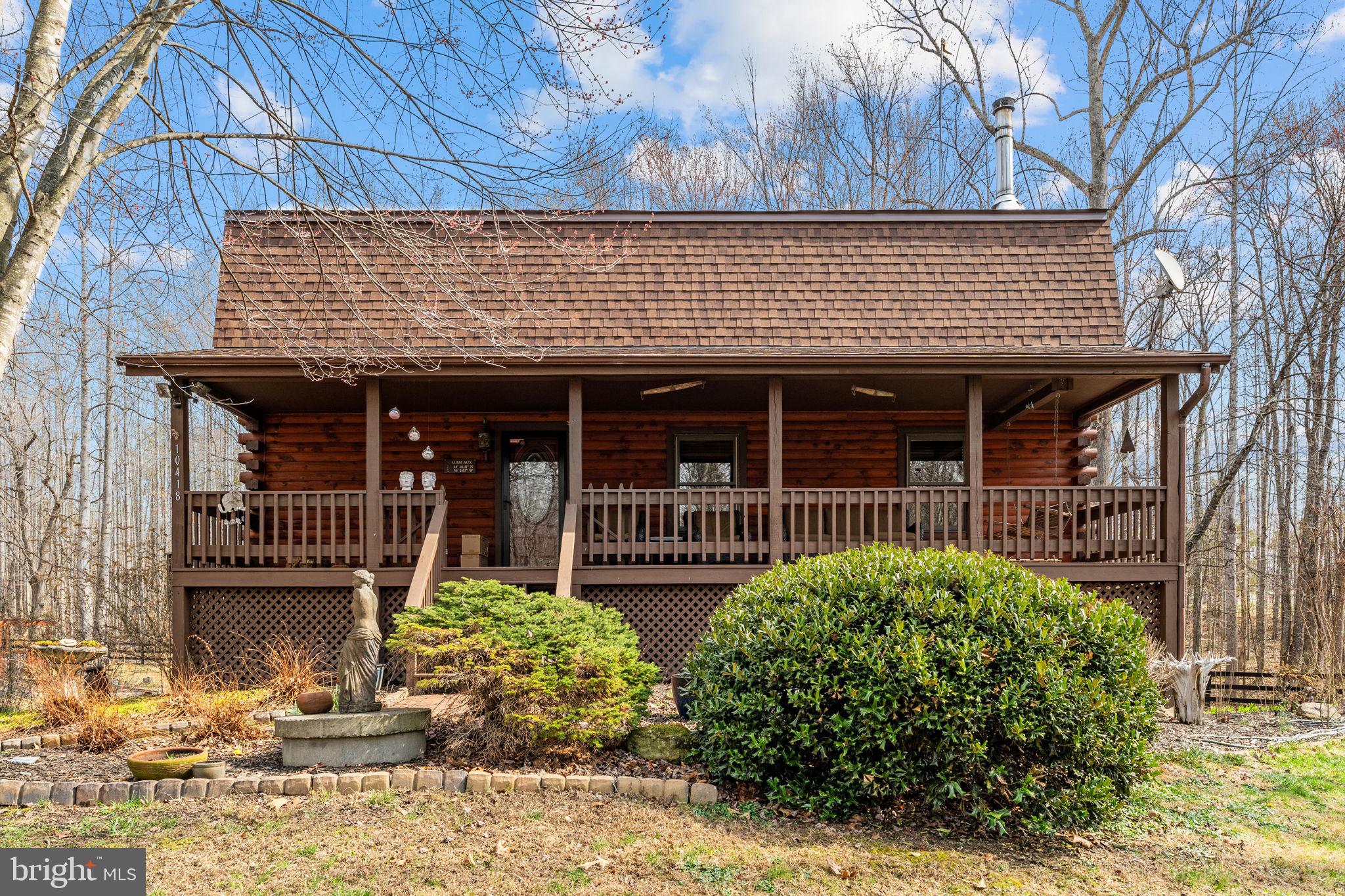 10418 Cliff Mills Road Marshall, VA 20115 - Photo 9 of 93 a front view of a house with garden