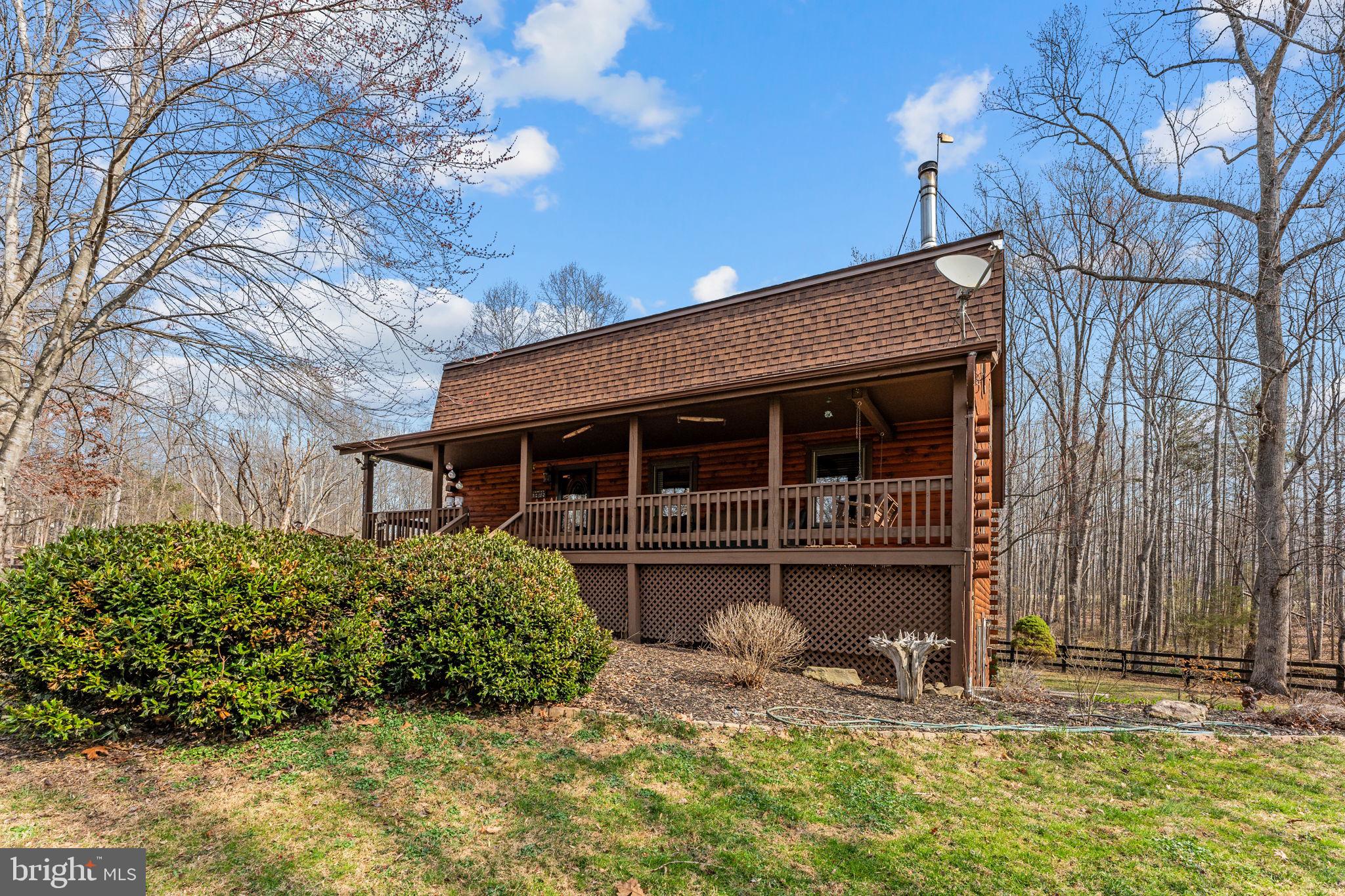 10418 Cliff Mills Road Marshall, VA 20115 - Photo 91 of 93 a front view of a house with a yard