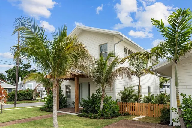 a front view of house with small garden