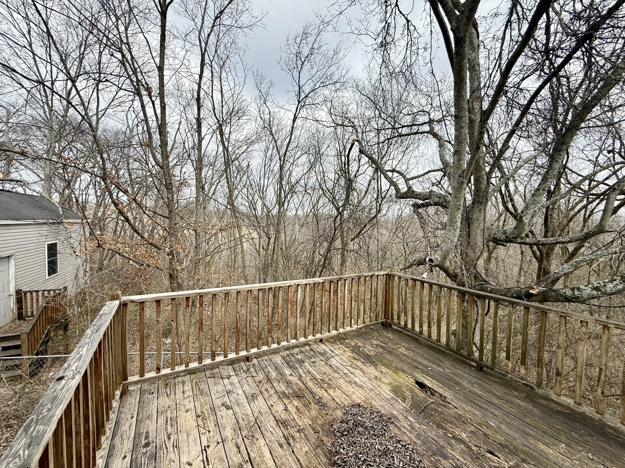 175 Crawford Hill Road Goodlettsville, TN 37072 - Photo 16 of 21 a view of balcony with wooden floor and fence