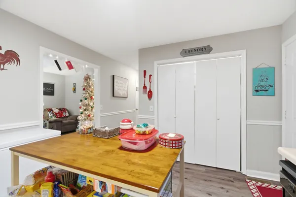 a room with furniture and wooden floor