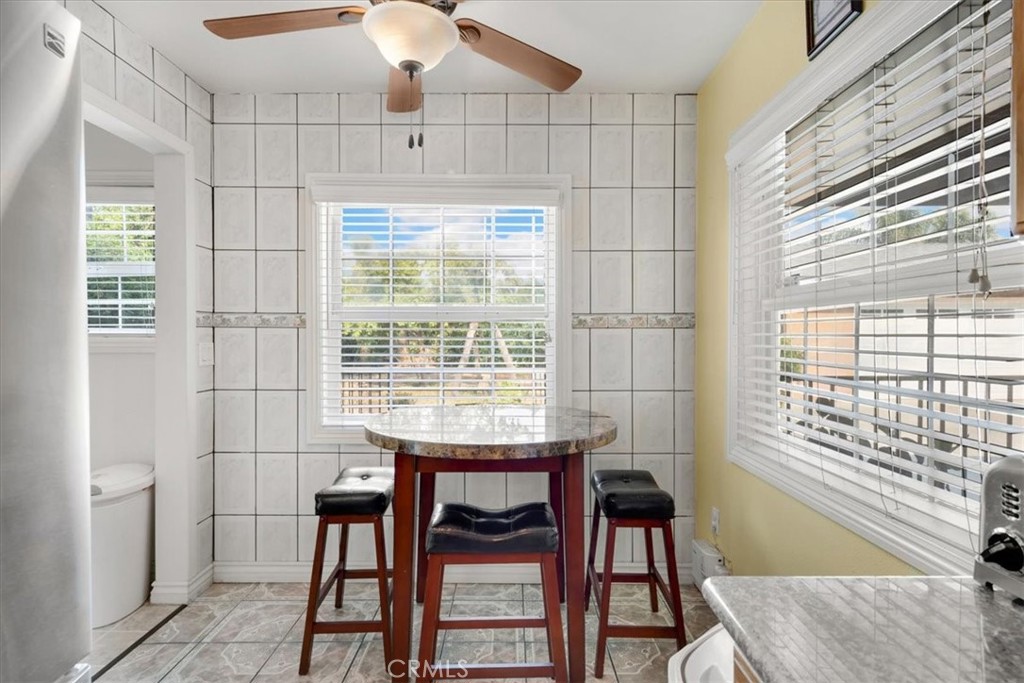 2183 Sinclair Street Pomona, CA 91767 - Photo 25 of 38 a bathroom with a sink and a large mirror
