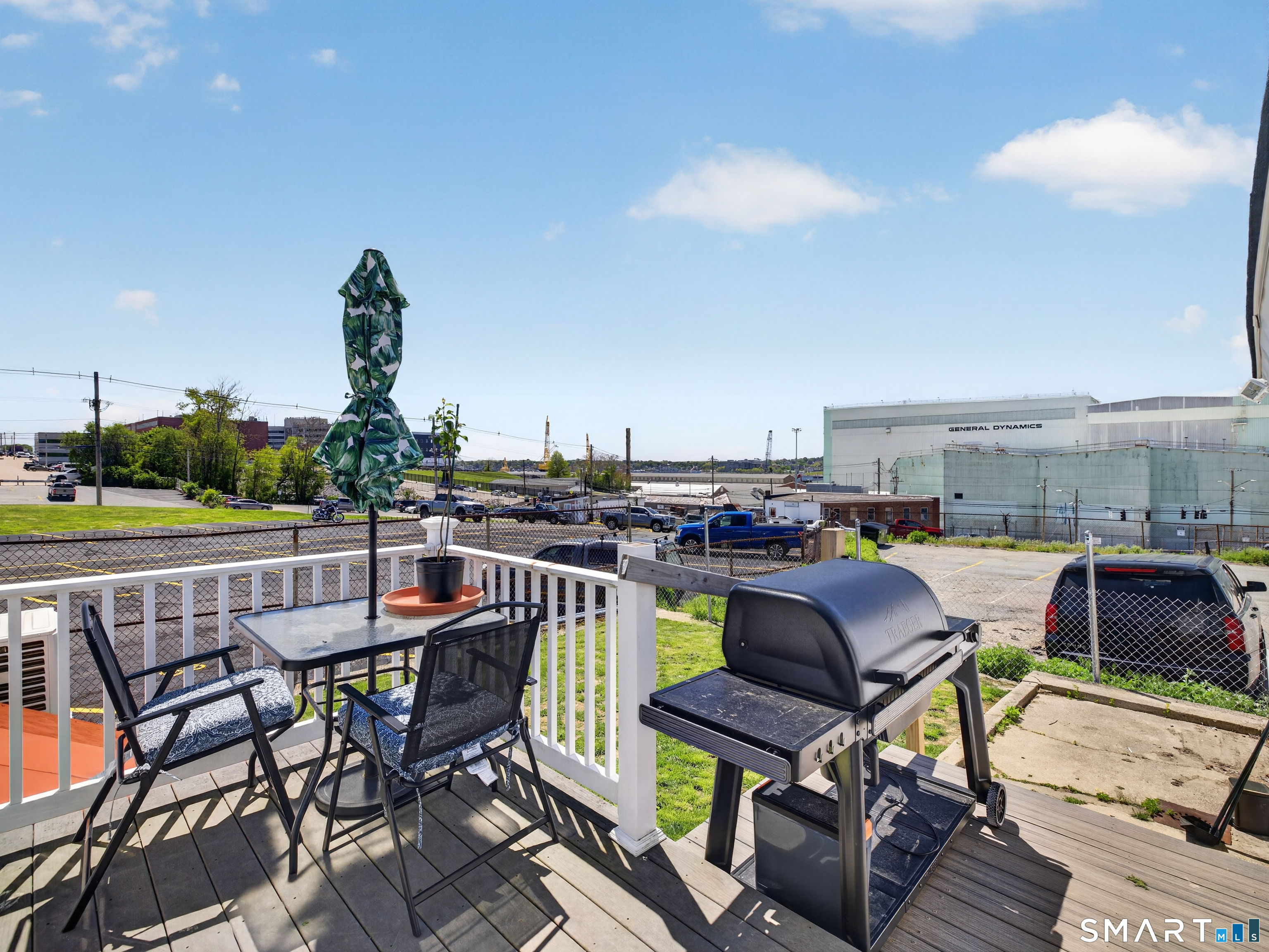 13 Oak Street Groton, CT 06340 - Photo 28 of 38 a view of a terrace with furniture and stove