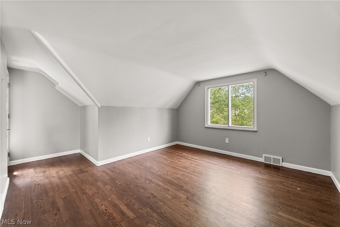 21779 Eaton Road Cleveland, OH 44126 - Photo 21 of 46 Bedroom featuring dark hardwood / wood-style floors and lofted ceiling