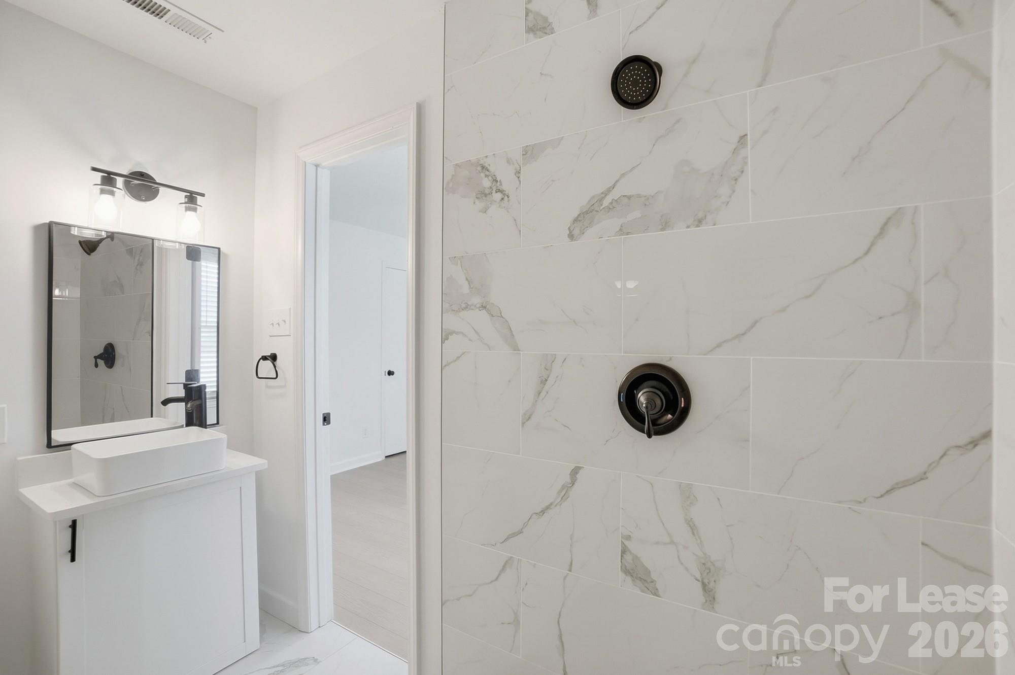 318 Hollis Road Charlotte, NC 28209 - Photo 15 of 30 a bathroom with a shower