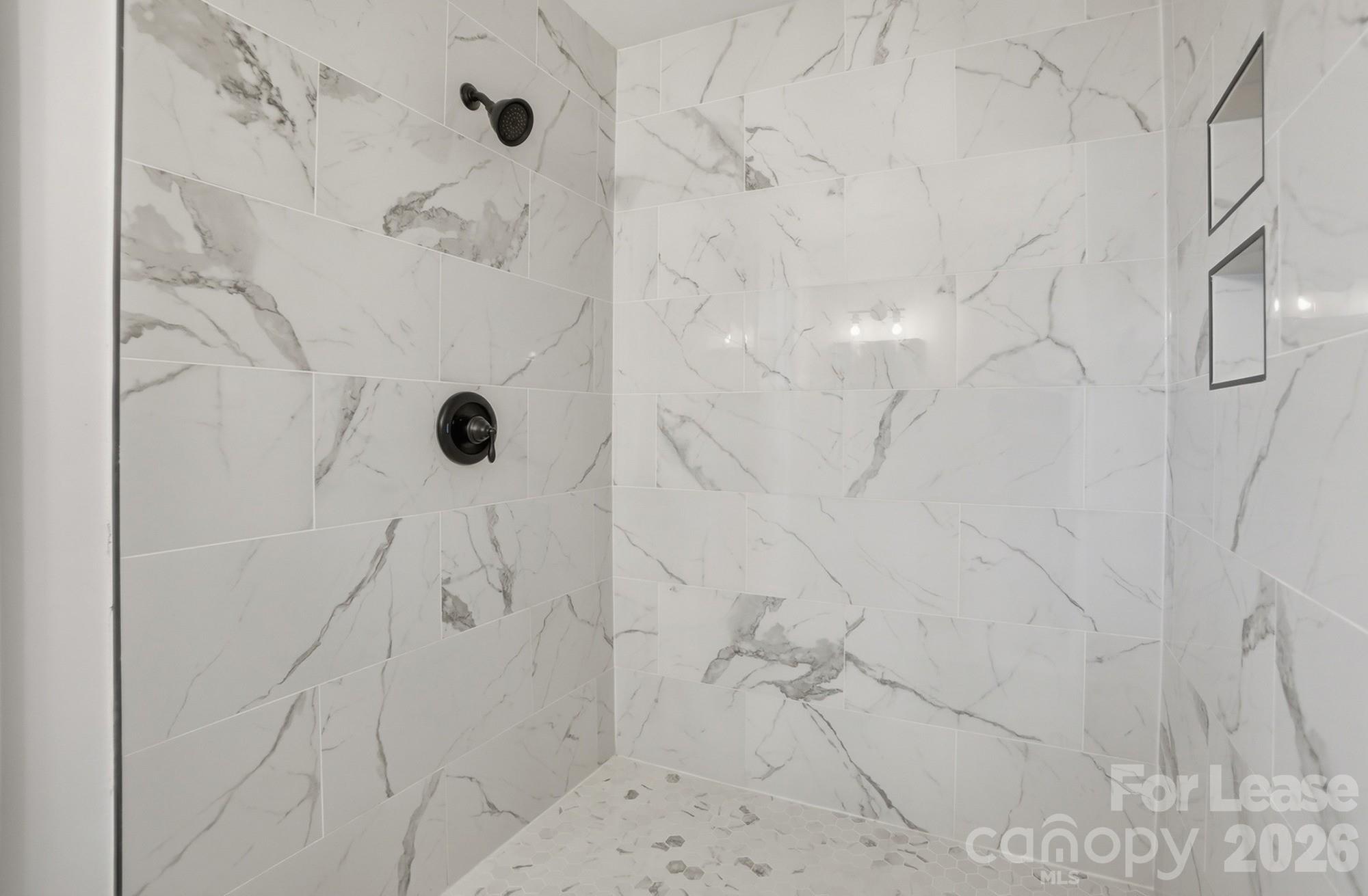 318 Hollis Road Charlotte, NC 28209 - Photo 16 of 30 a bathroom with shower