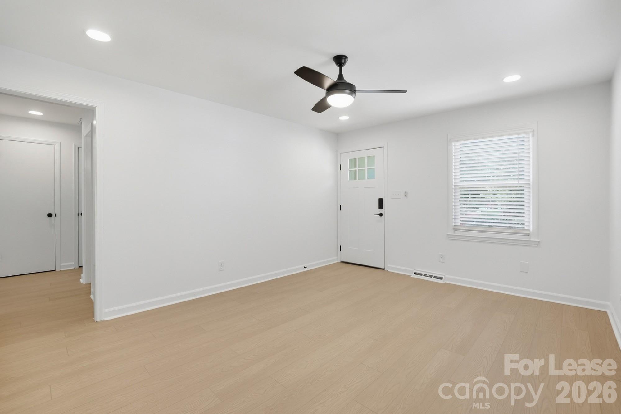 318 Hollis Road Charlotte, NC 28209 - Photo 2 of 30 a view of an empty room with a window