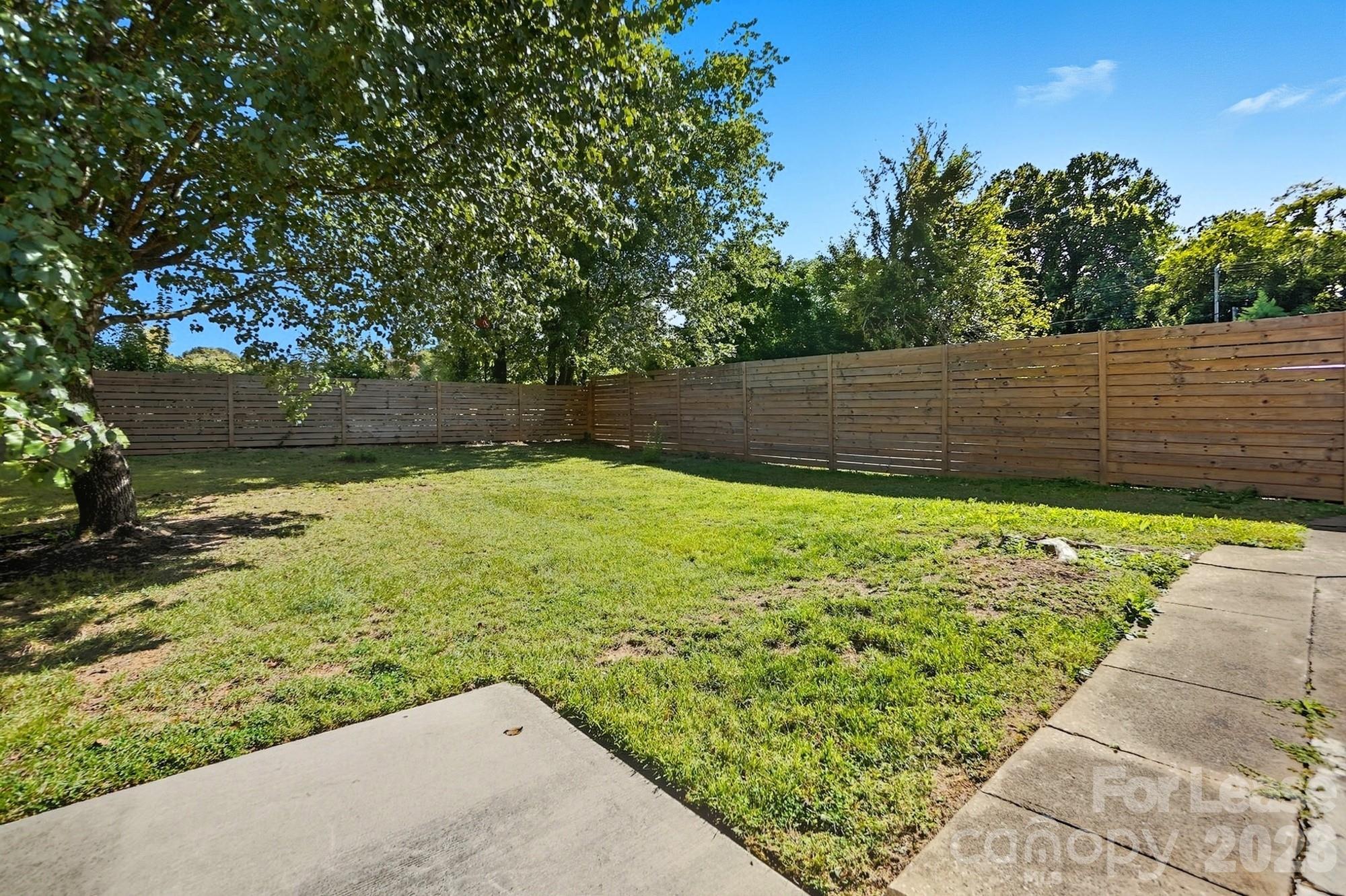 318 Hollis Road Charlotte, NC 28209 - Photo 27 of 30 a view of a back yard