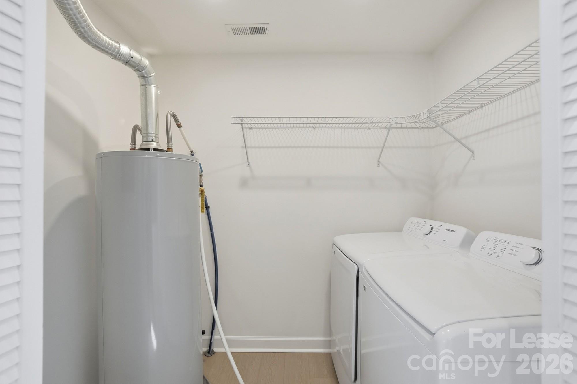 318 Hollis Road Charlotte, NC 28209 - Photo 10 of 30 a utility room with dryer and washer