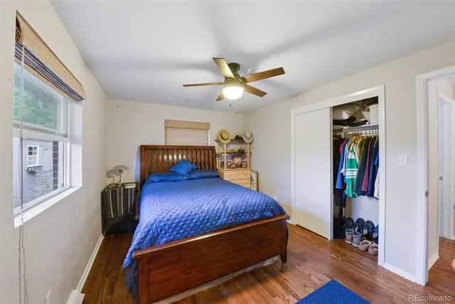 a bedroom with furniture and a window