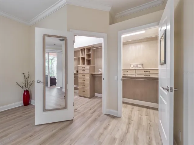 a view of a house with pool and a yard