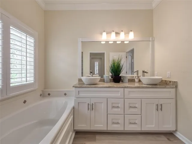 a view of a golf course with a house