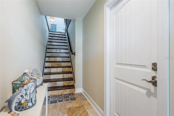 a view of a hallway with entryway