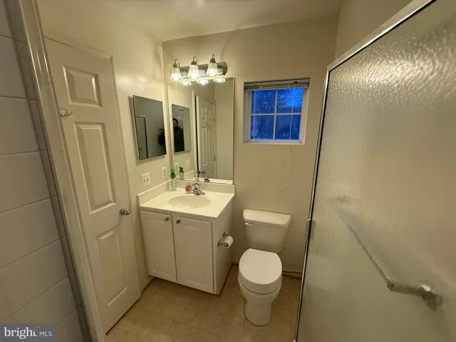 a front view of a house with glass windows