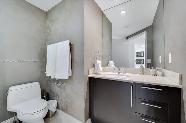 a bathroom with a sink and a toilet