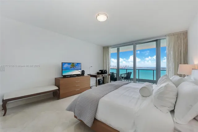 a view of a terrace with furniture and a potted plant